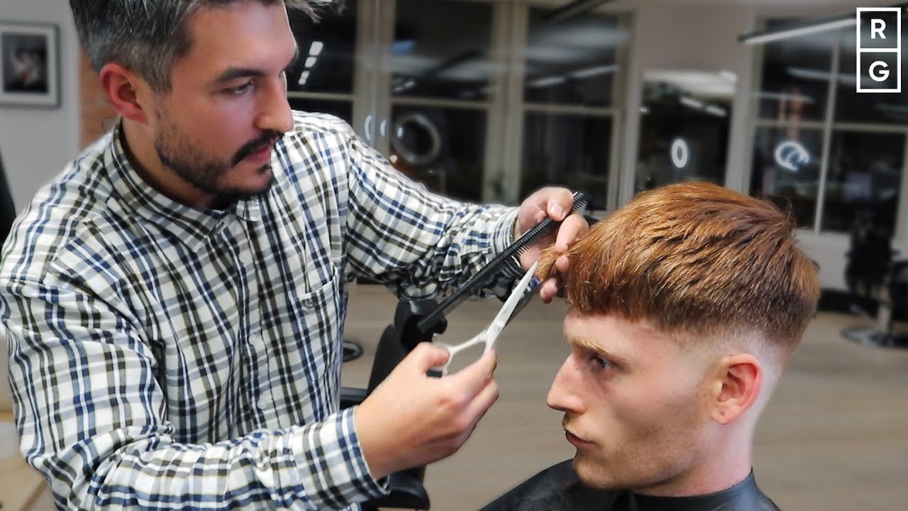 Textured Crop Blunt Fringe Mens Haircut With Low Skin Fade