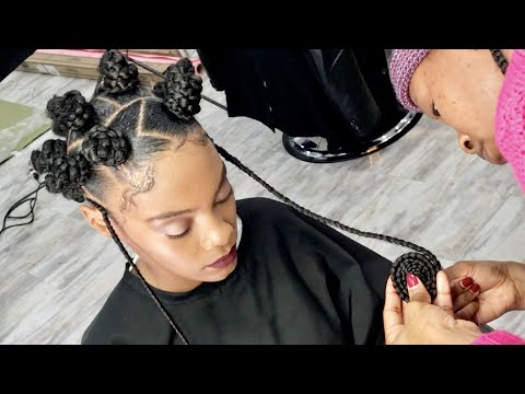 BRAIDED BANTU KNOTS ON NATURAL HAIR WITH SIDE PENDULUM BRAIDS....Super creative