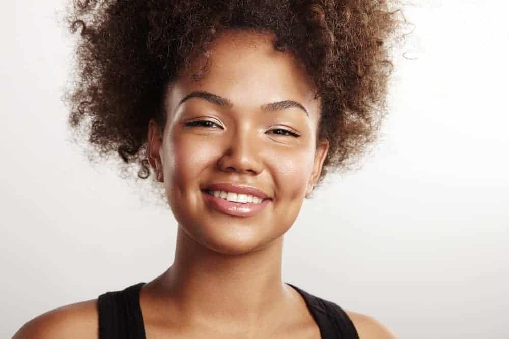 African American female creating her natural hair regimen