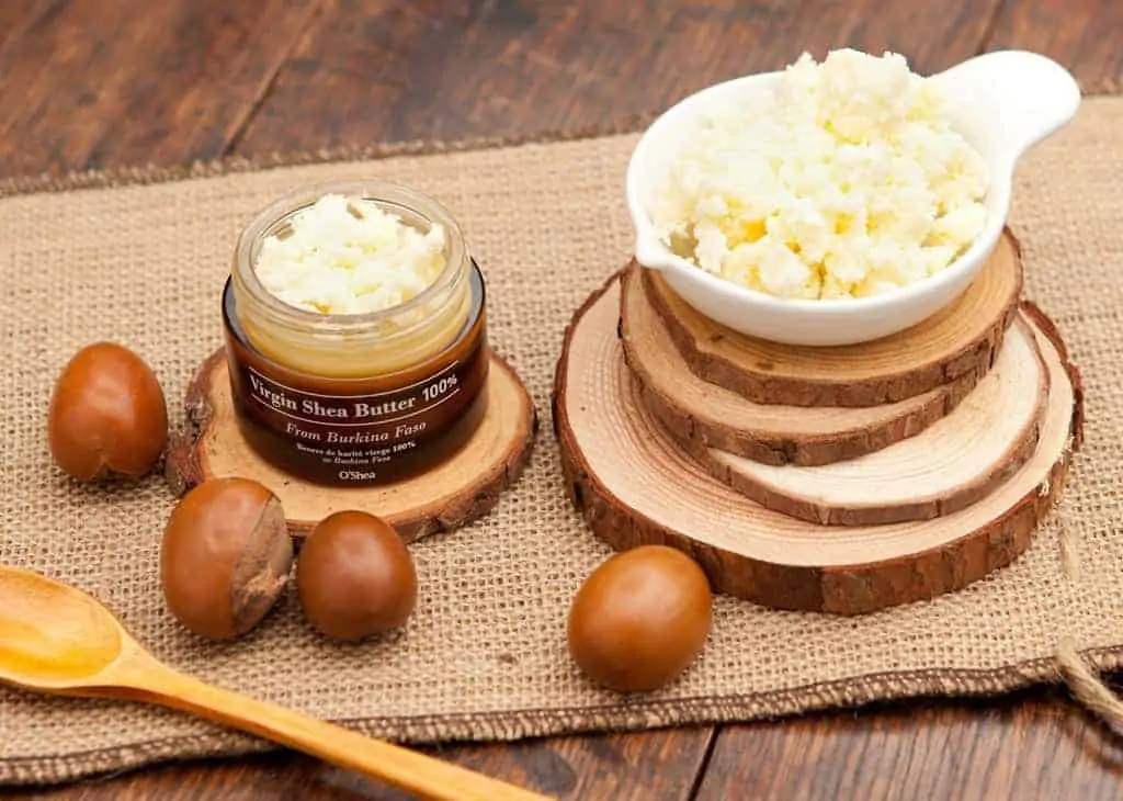 Detailed look at a shea butter mask and shea nuts that can be used for damaged hair or to promote hair growth when combined with other natural oils.