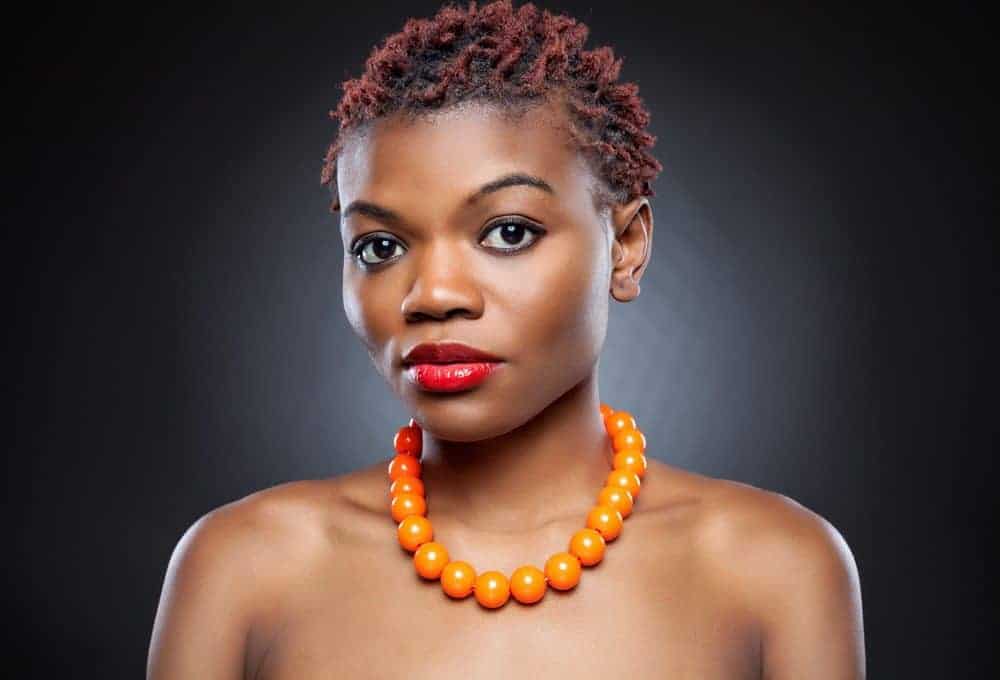 African American female with natural hair rocking a beautiful TWA hairstyle.