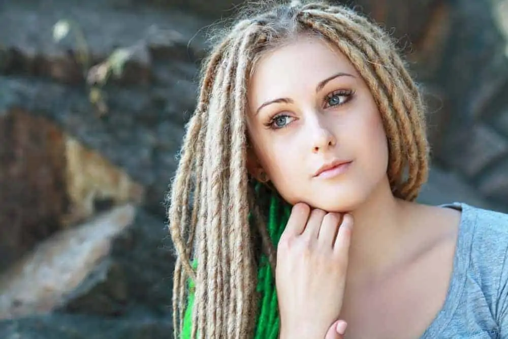 Pretty white girl wearing free long dreads on type 1 natural hair