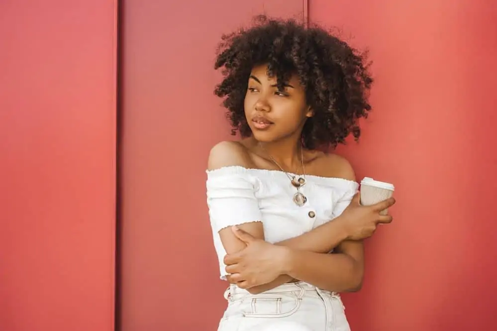 Flexible Curling Rods: How to Use Flexi Rods on Natural Hair 6 Light-skinned black female wearing flexi-rod curls with styling cream after drying her freshly washed wet hair.