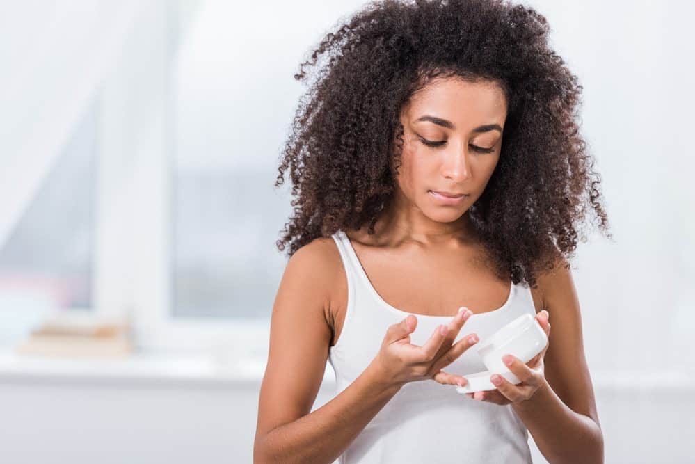 The Curly Girl Method for Curly, Wavy, Straight & Color Treated Hair 6 Women conditioning hair because the Curly Girl Method requires you to stop using shampoo