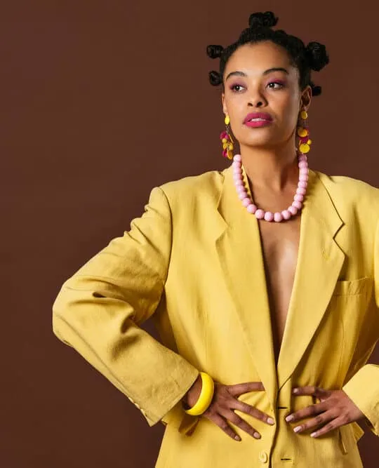 African American female wearing bantu knots