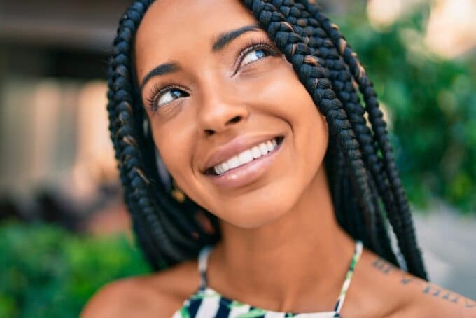 Protective Styles: How To Do a Protective Style on Natural Hair 9 Close-up image of African American female wearing a braided ombre protective style.