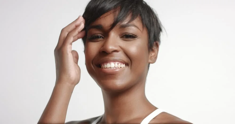 How To Do a Silk Wrap on Natural Hair at Home 5 African American female with type 4 naturally curly hair that's been relaxed.