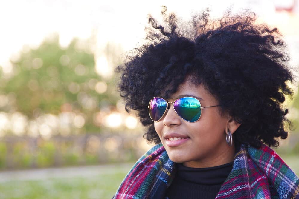 Cover photo of black woman for article on how to get Vaseline out of hair