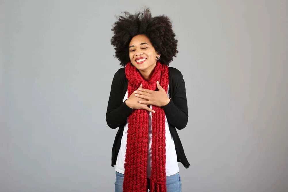 What is Coily Hair and How Do I Care for It? 10 African American female with 4c kinky, naturally curly hair.
