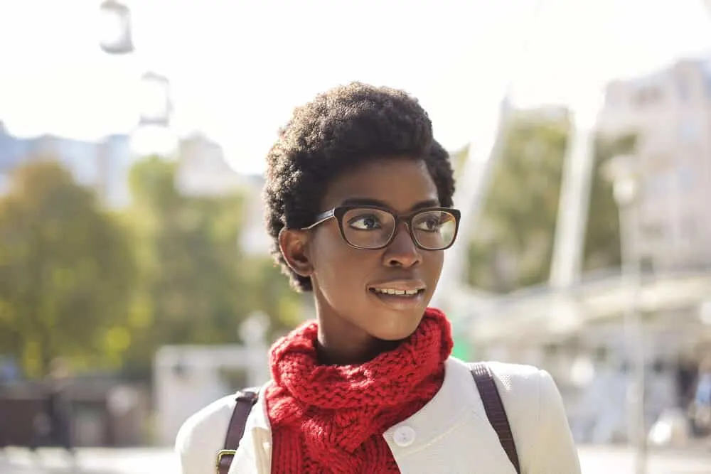 Is There a 4D Hair Type? Products, Maintenance, and Pictures 5 Black girl with 4D curls wearing a cute afro with extreme shrinkage and a cotton texture.