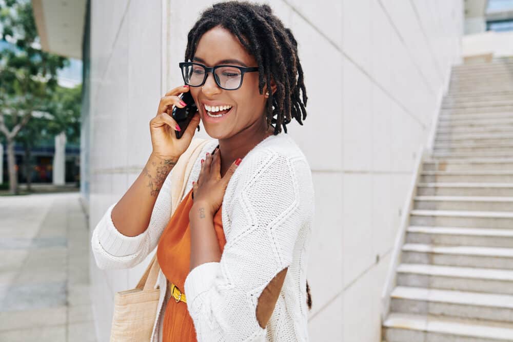 A pretty black lady used a thorough dread detox and natural oils to promote hair growth.