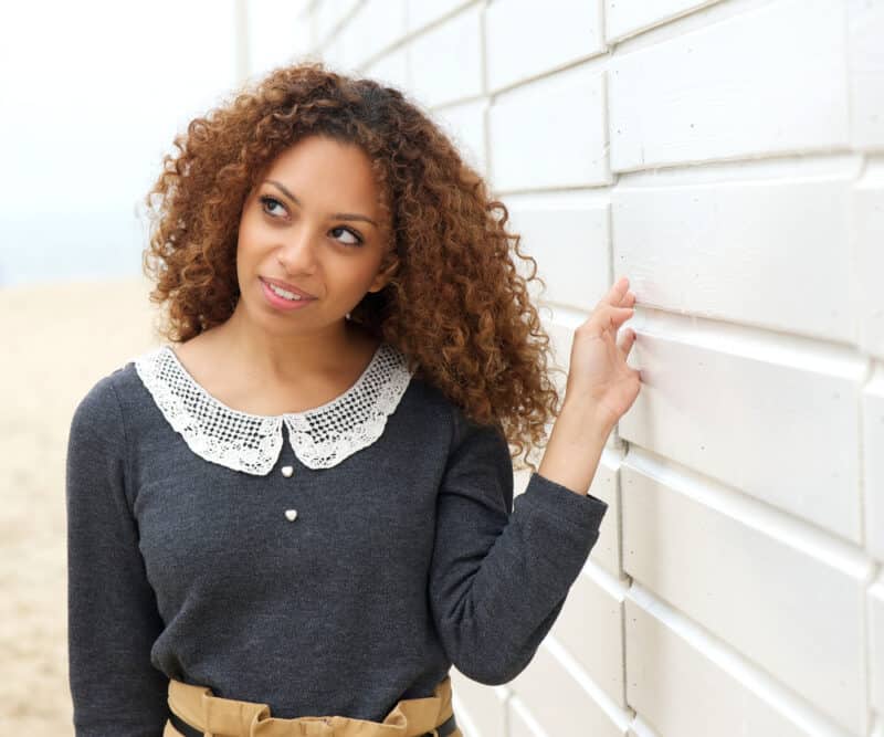 Women with a partial balayage look on black and brown gorgeous tresses.