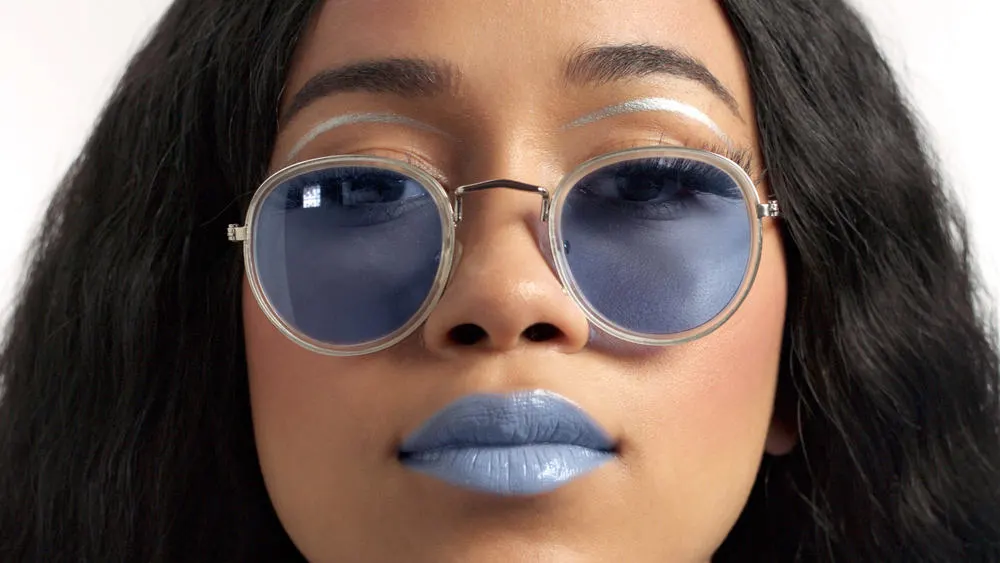 How To Do Quick Weave Hairstyles: Step-by-Step DIY Guide 3 Light skinned woman with blue lipstick that's decided to wear quick weave extensions over her own hair.