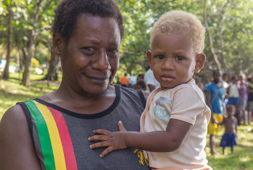 Melanesian kid with natural blond hair due to a native gene common in the island's population