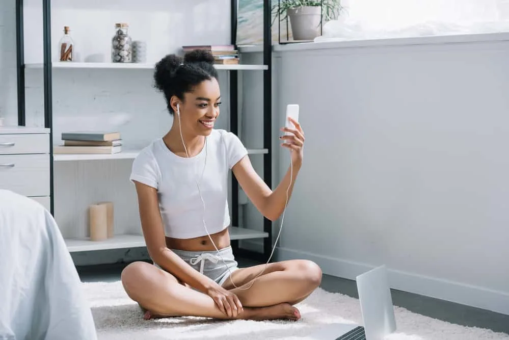 Afro Puffs Tutorial: ‘How to Do' Styling for Natural Hair: Complete Guide 6 Cute African American female wearing thicker puffs on her natural curls