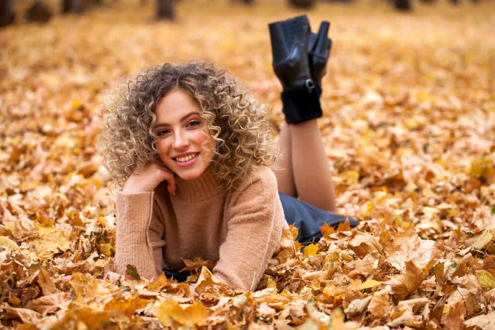 Caucasian female with a new texture due to a beach wave perm