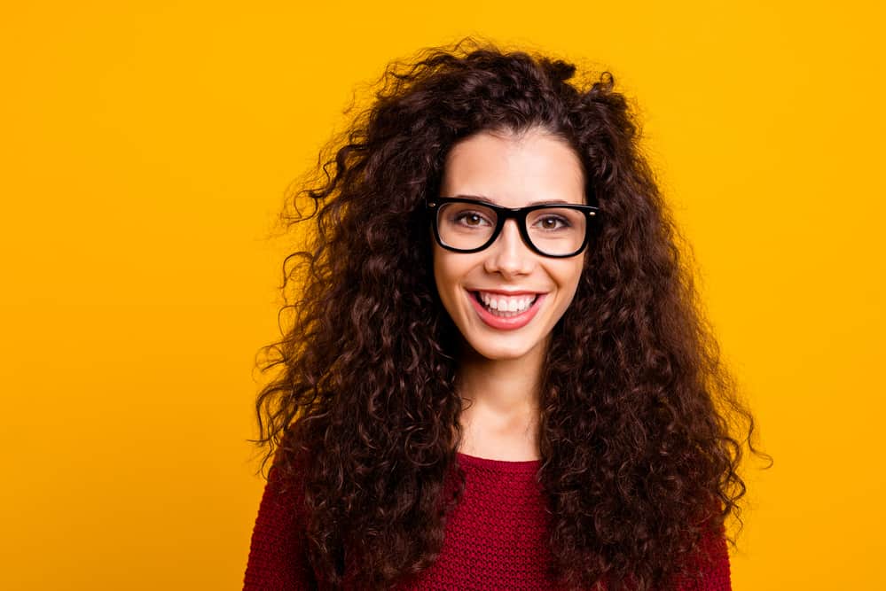 Attractive lady with type 3 hair type following a cold perm technique