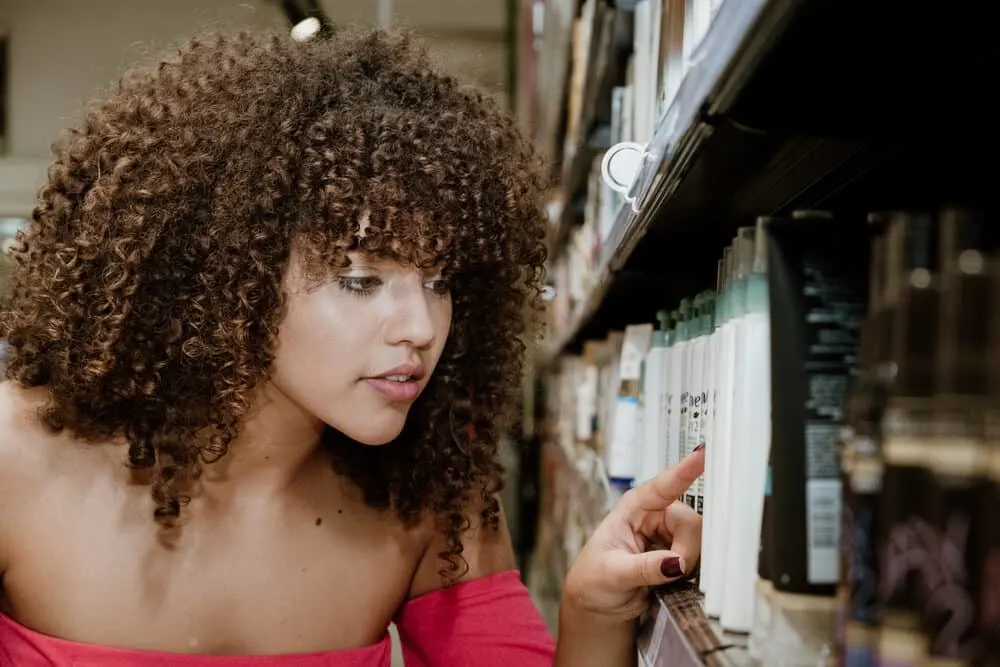 Is Garnier Fructis Good for Your Hair? What About Curly Hair? 2 African American female searching for Garnier Fructis Sleek in Target