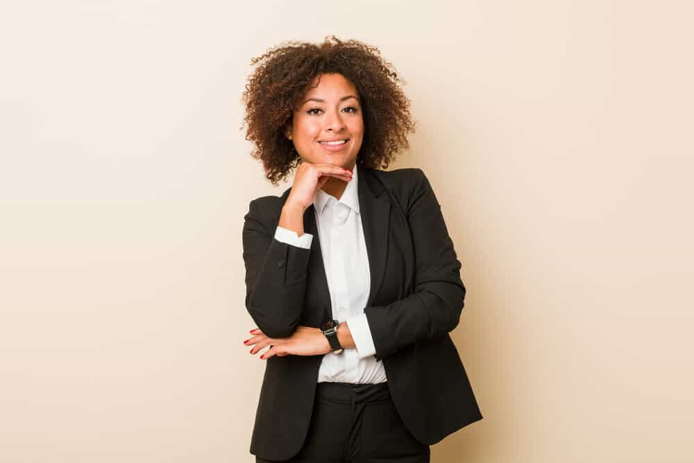 Black female wearing a black professional suit