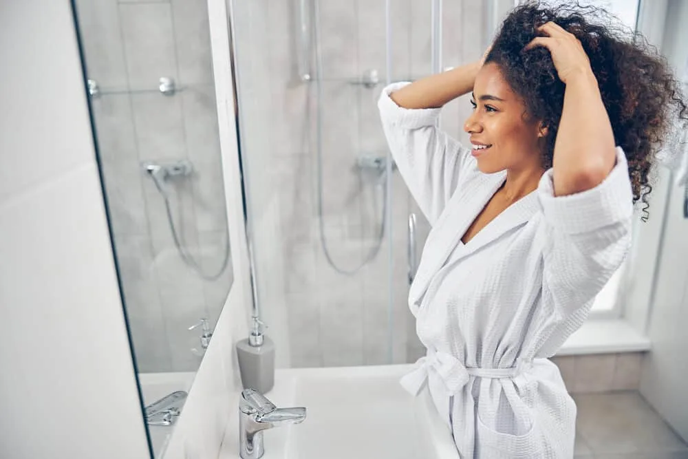 How To Dry Your Hair With a Towel Without Damaging It (Fast)