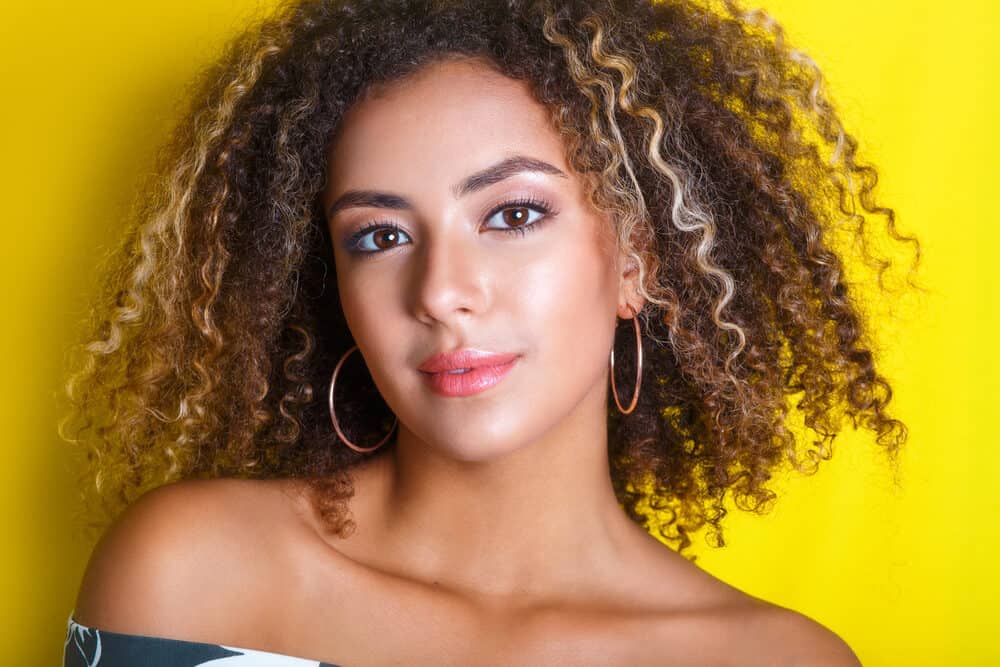 Mixed race African American female starting her curly hair journey 