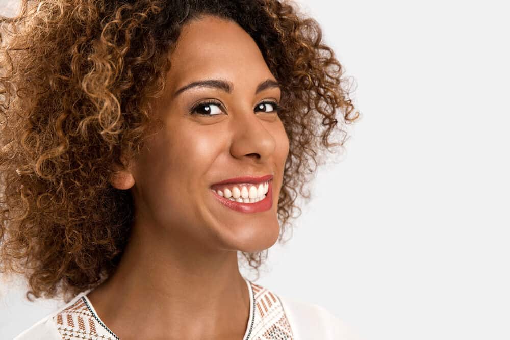 Beautiful African American woman with curly virgin hair