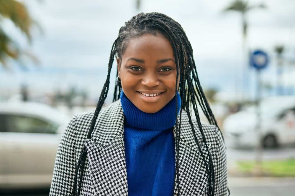 Young African American female with microlocks starting her dreadlock journey