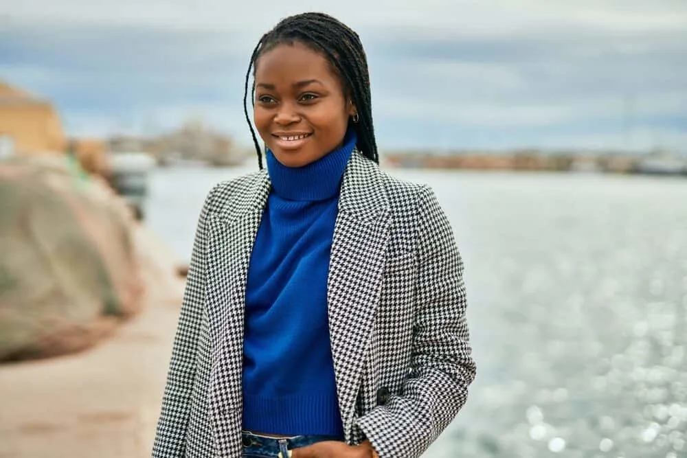 Sea Salt and Lemon Juice on Dreads: Is It Good? What Does It Do? Complete Guide 5 Cute black girl standing near the beach aloe vera rinse treatment for her 4B locs