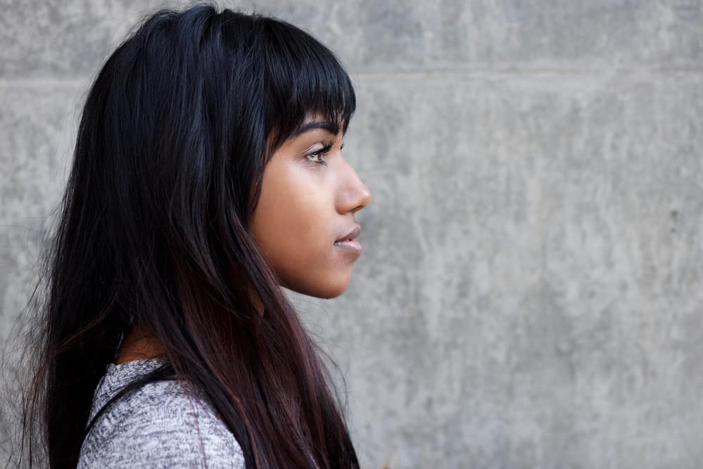 Muslim Indian lady with long straight hair with brown and black hair dyes