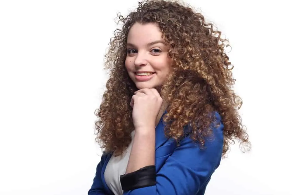 Is Shea Moisture Good for White Hair or Only Ethnic Hair? 4 White girl with soft curls with great body wearing a blue business suit