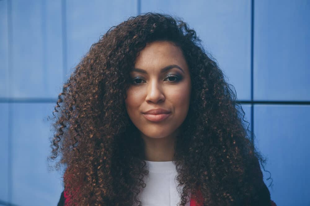 Cute black girl with ombre hair color styled with an all-natural de-frizzing shampoo