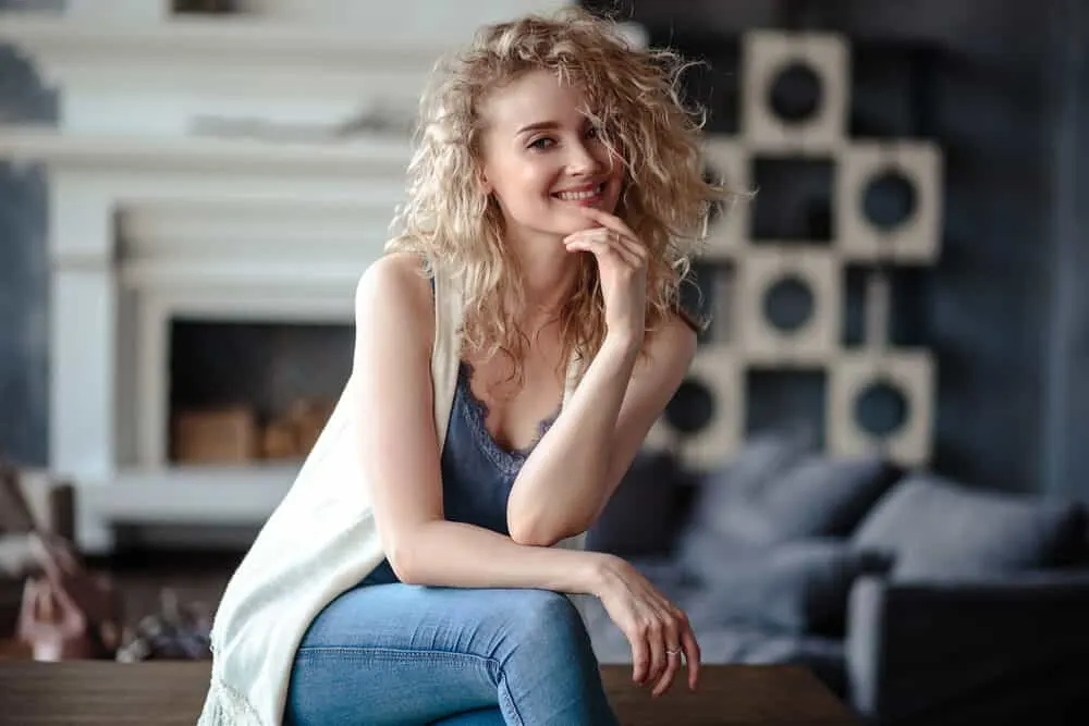 Castor Oil for White Girl Hair Types: Complete "How-to" Guide 8 Pretty Caucasian girl preserving her scalp's natural oils with vitamin E and egg yolk oil