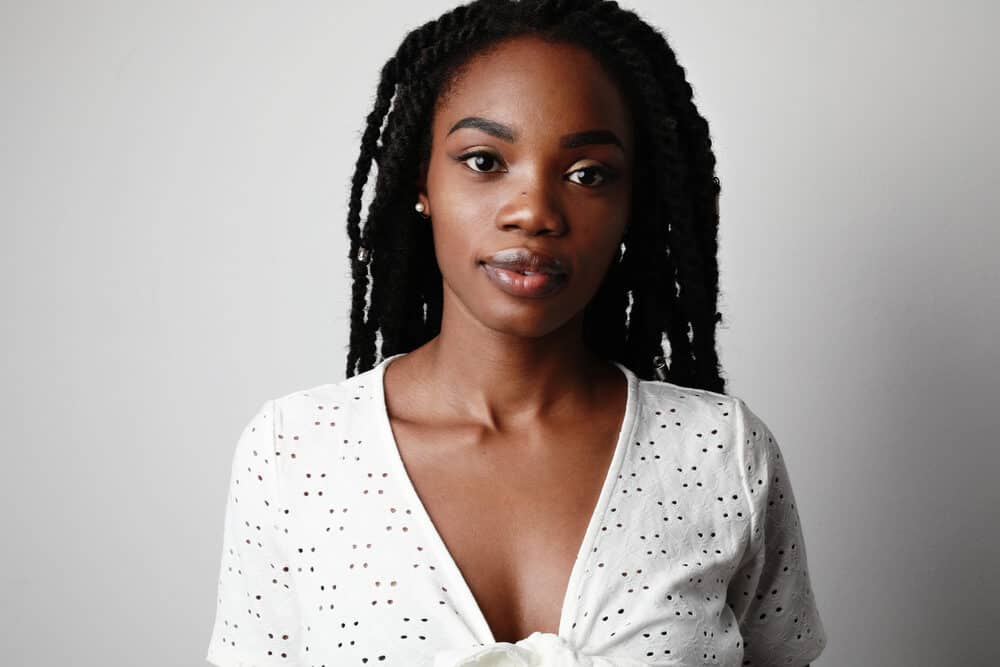 African American woman with a braided hairstyle with human hair for a more natural look