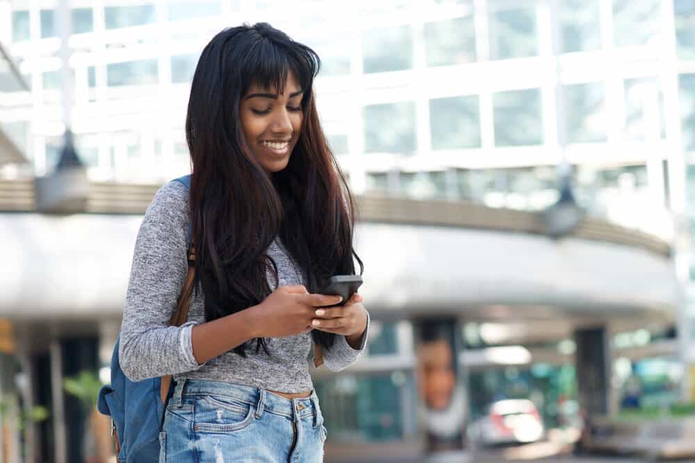 Young woman in downtown Bengaluru wearing hair extensions made from synthetic hair