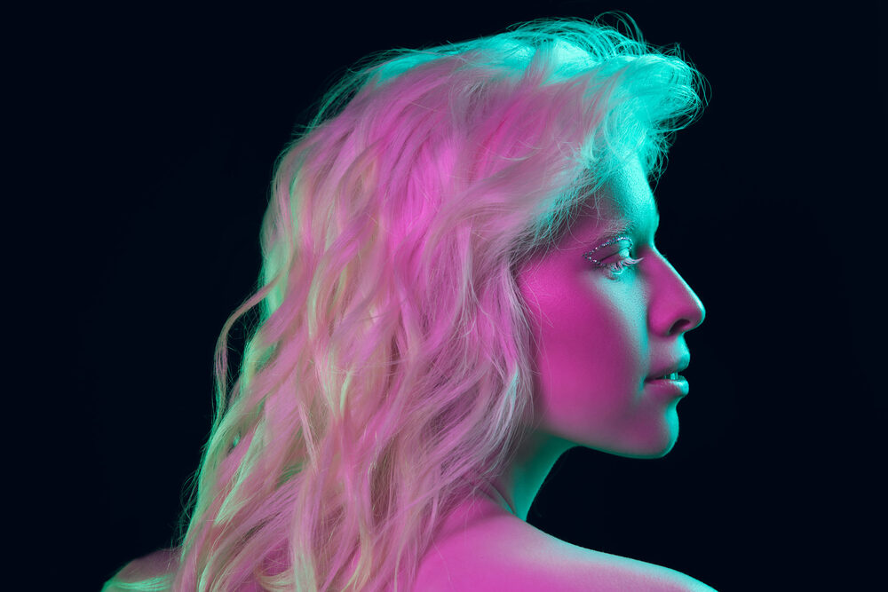 Lady with very pale skin without any color pigment in her hair or eyelashes.