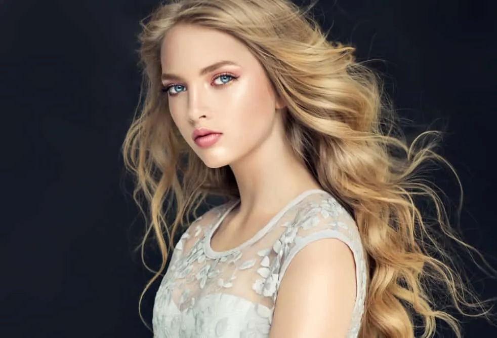 6 Rare Hair Colors: What Is the Rarest Hair Color in the World? 3 White girl with natural blond hair which is one of the rarest natural hair colors in the world's population.