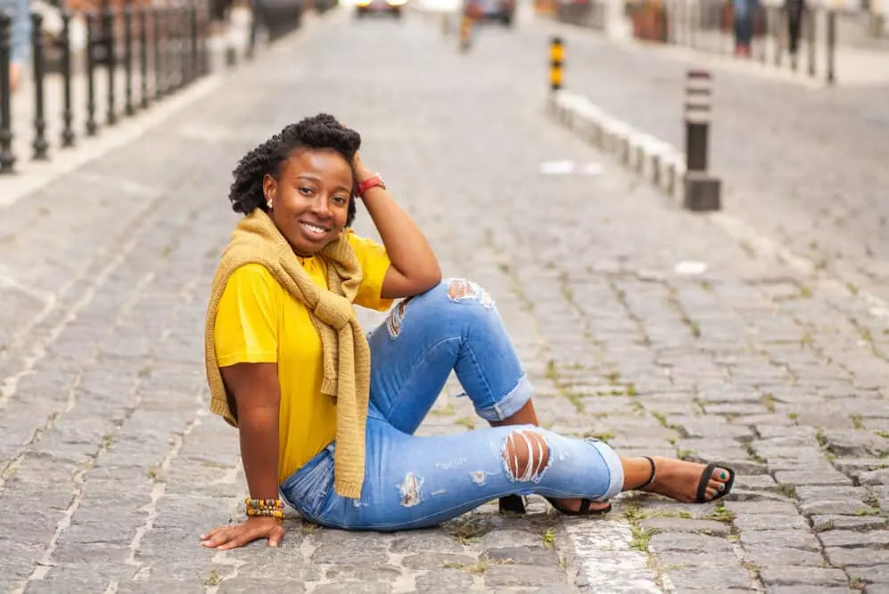 Can Your Hair Get Moldy? What Causes It? How To Get Rid of It? 3 Lady wearing casual clothes including torn jeans with 4B healthy hair strands.