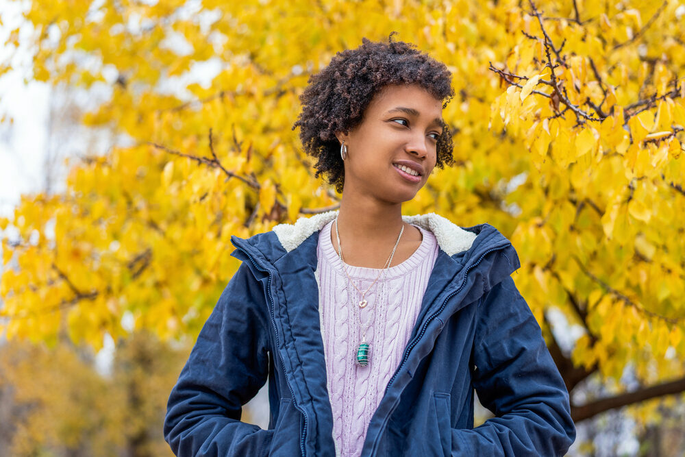 Curly girl with thick hair with poor porosity wearing a wash and go hairdo with great curl definition.