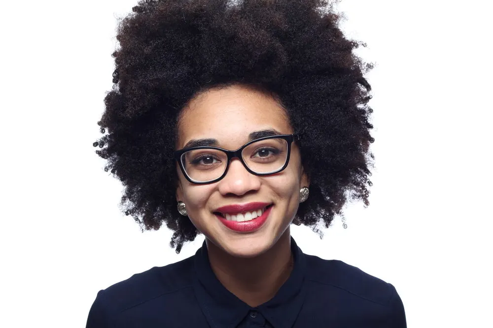 6 Rare Hair Colors: What Is the Rarest Hair Color in the World? 7 African American female with jet black hair and walnut brown skin tone.