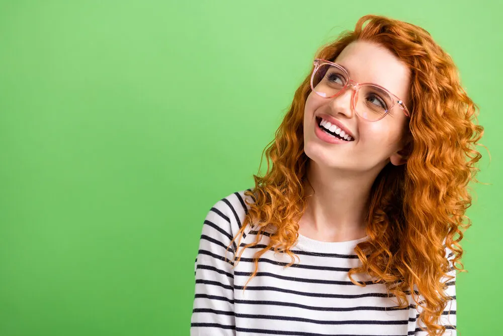 6 Rare Hair Colors: What Is the Rarest Hair Color in the World? 11 White lady with dark brown curls - one of the most common hair colors in the world.