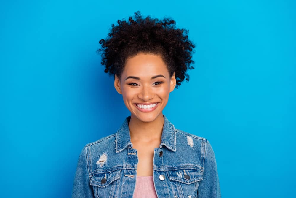 Cute African American female with dark brown permanent hair colour on 4A human hair type.