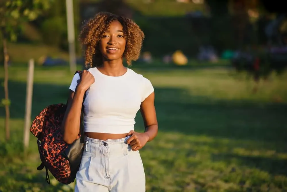 How Long to Leave Hair Dye In: Semi-Permanent and Permanent 2 Young black female in casual clothes with a dark brown natural hair color on 4A fine hair strands.