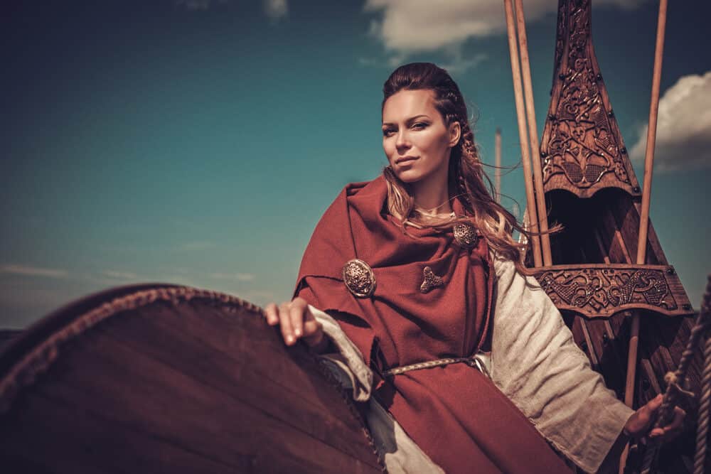 Viking discovered sporting dreadlocks as she rides on a ship into battle.