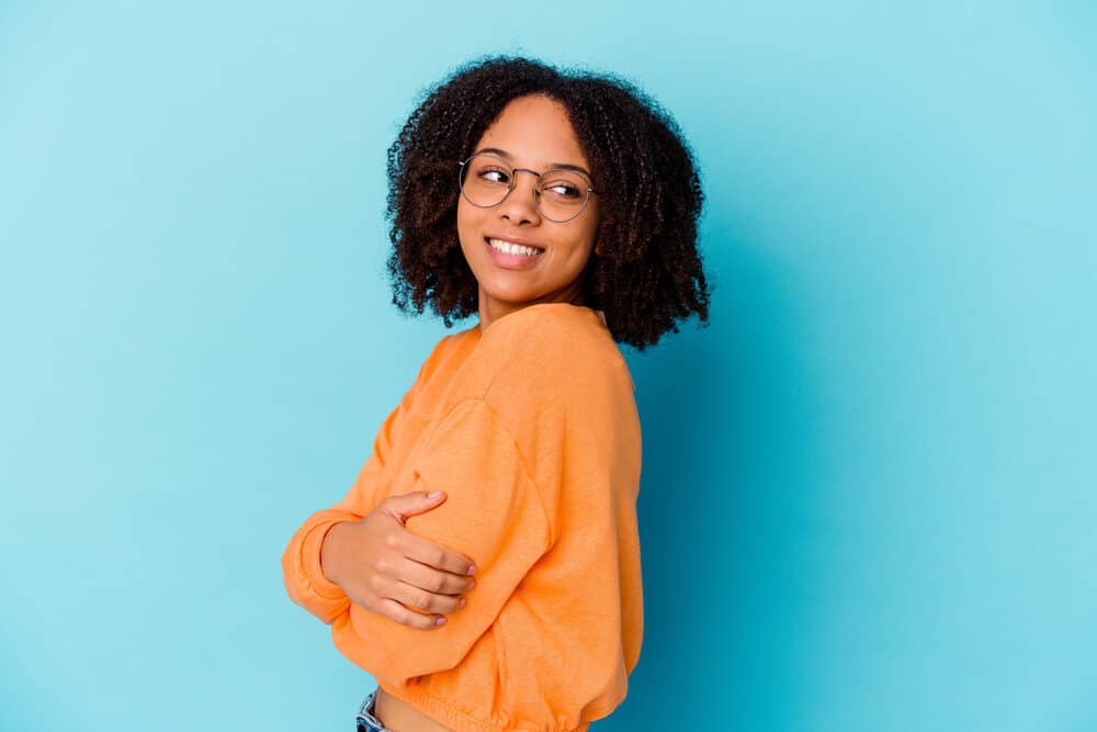 African American woman wearing a cute wash n go style created with raw sea moss in gel form.