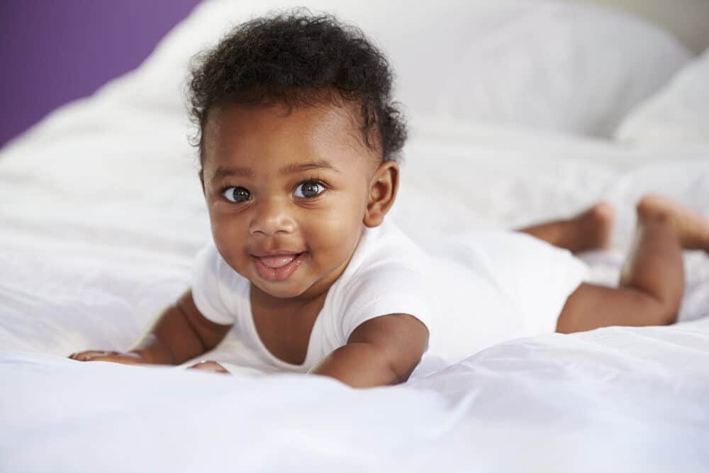 Black baby born with so much hair on her head during fetal development, but it's mostly on top similar to other babies.