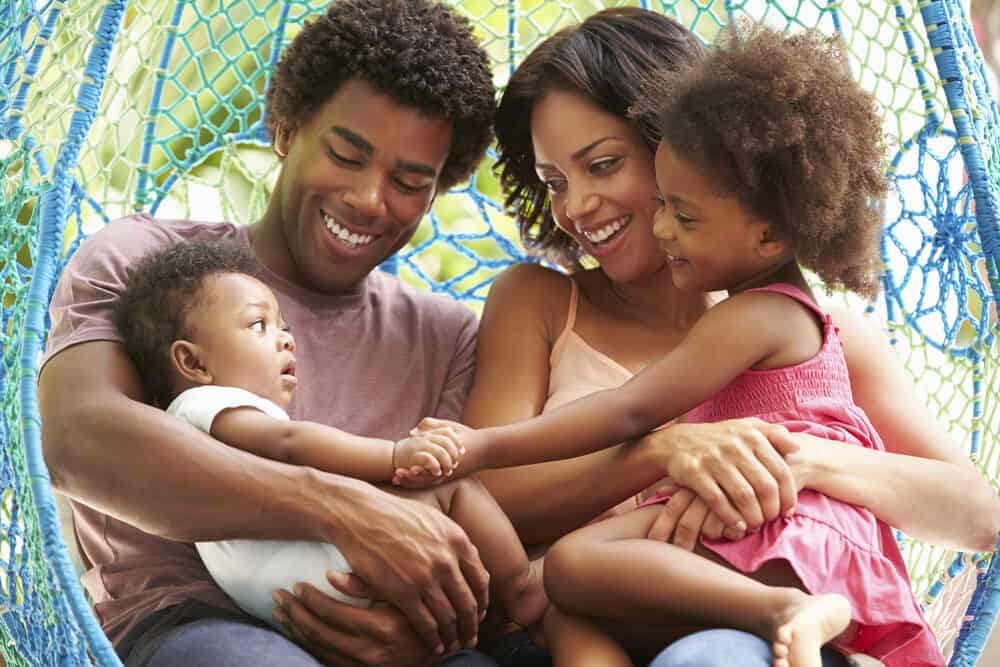 A great-looking African American family with two babies born within the last three years.