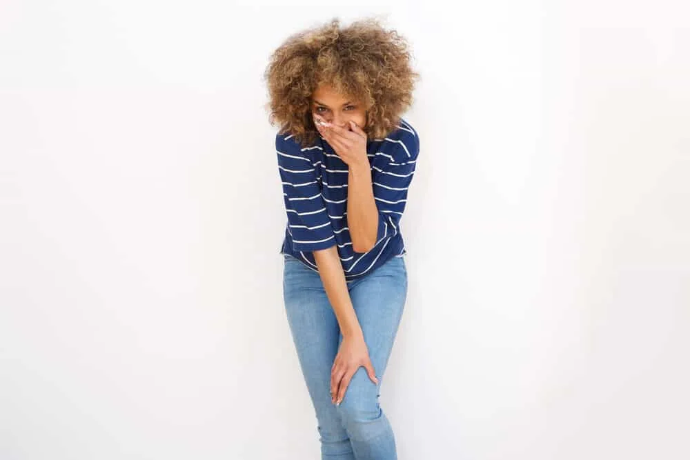 What Does Clarifying Shampoo Do to Colored Hair? Lighten? 5 A lady laughed after using a purple shampoo and Vitamin C tablets to tone her own hair.