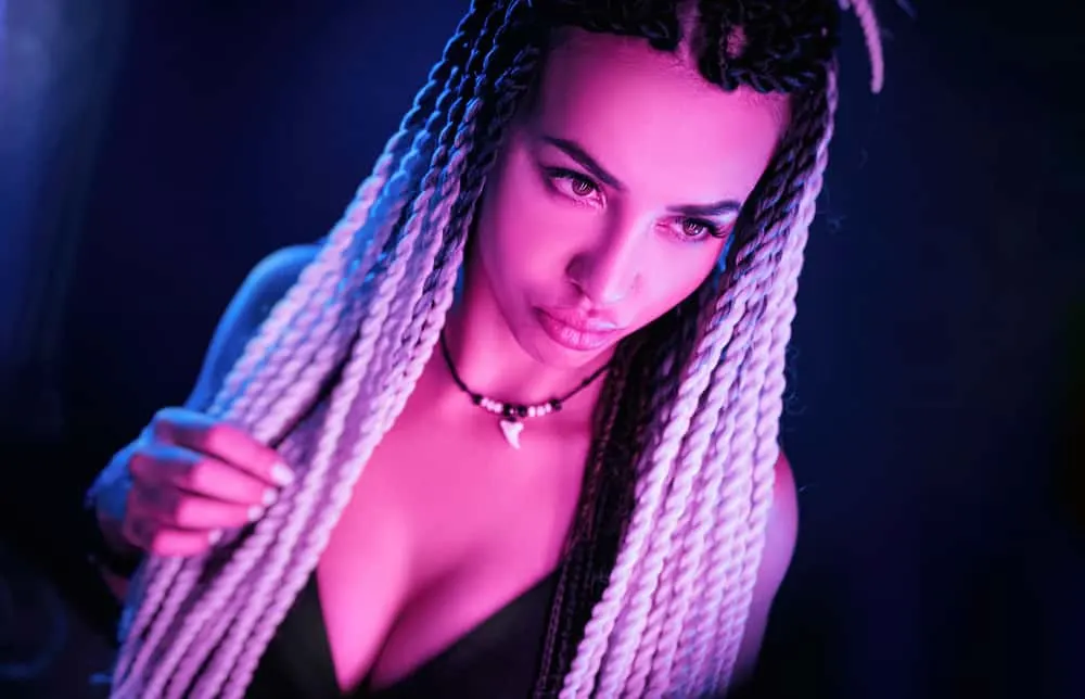 Thai Braids: Are Braids Part of Thai Culture or Cultural Appropriation? 3 Fine young woman with white and black hair taking a selfie for her Facebook, Instagram, and Twitter profiles.
