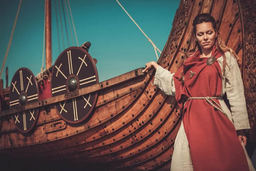 Did Vikings Have Dreads or Braids? Who Wore Dreadlocks First? 7 White girl that wanted to get locked hair from her braided hair style looking down into the water.