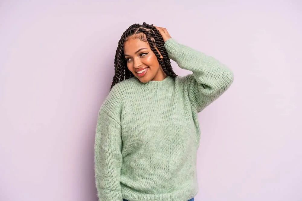 Mexican Braids: Are Braids Part of Mexican Culture? 11 A Latina female wearing box braids that could be enhanced with colorful highlights.